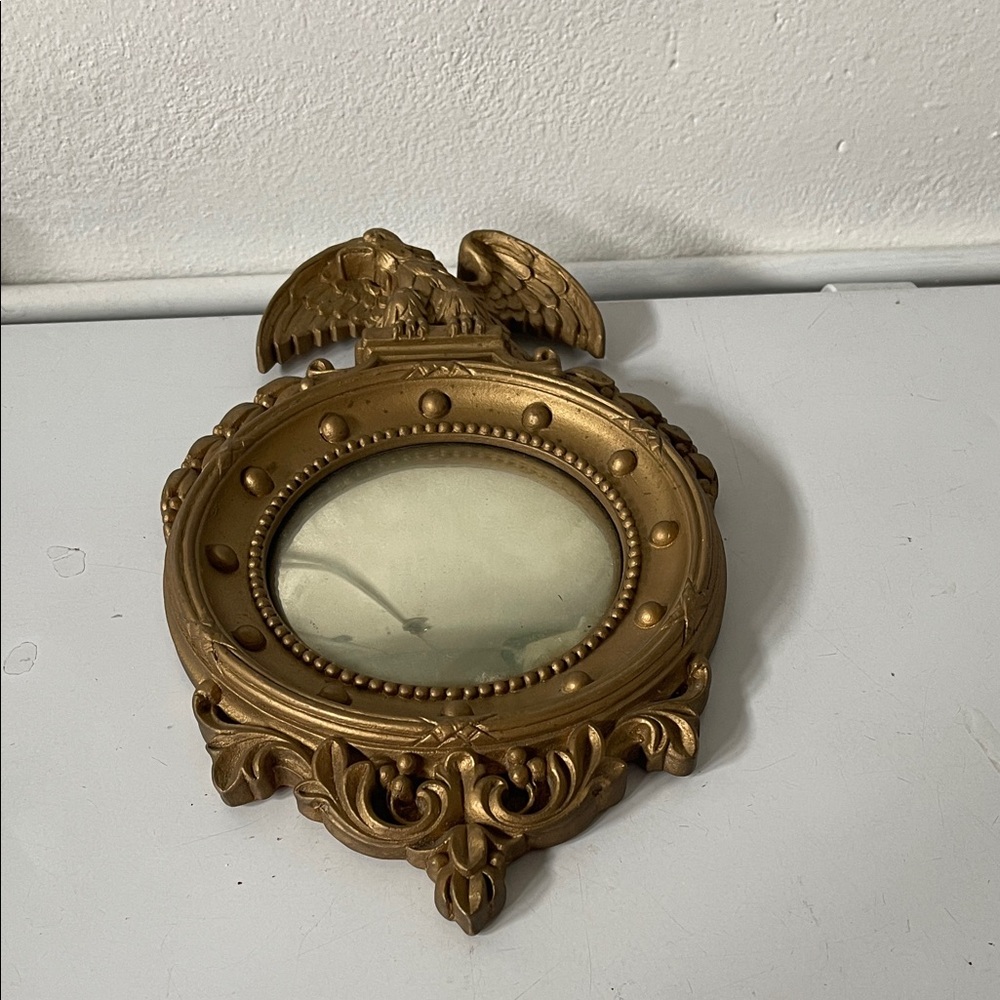 Vintage antique SYROCO gold American Eagle convex mirror.